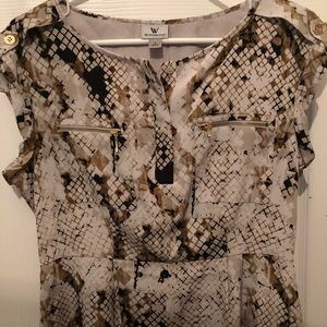 Brown black and cream pattern dress.